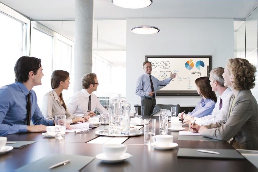 Coaching avec tableau sur la nutrition et le leadership